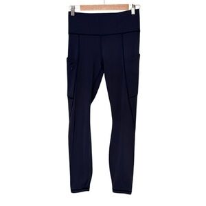Athleta Navy Midnight Blue double side pockets 7/8 Length pants leggings